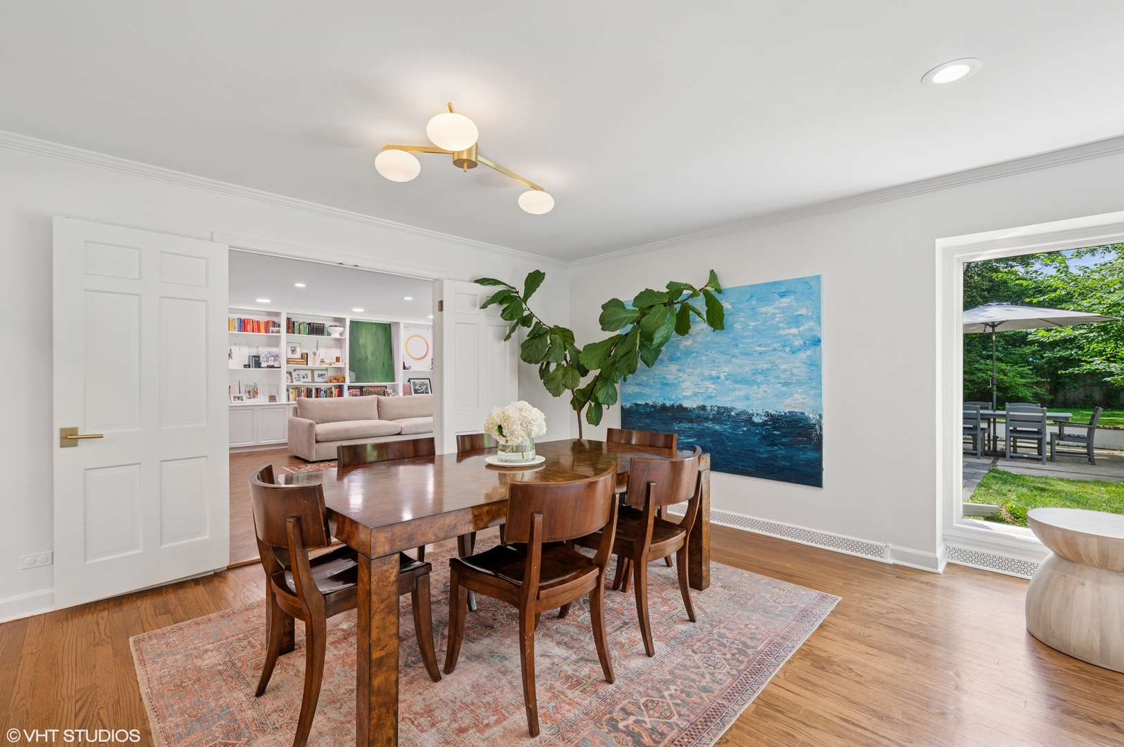 1560 Tower Road Winnetka, IL 60093 - Photo 5 of 27 a view of a dining room with furniture and wooden floor