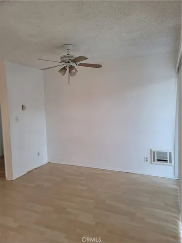 a bathroom with a toilet sink vanity tub and shower