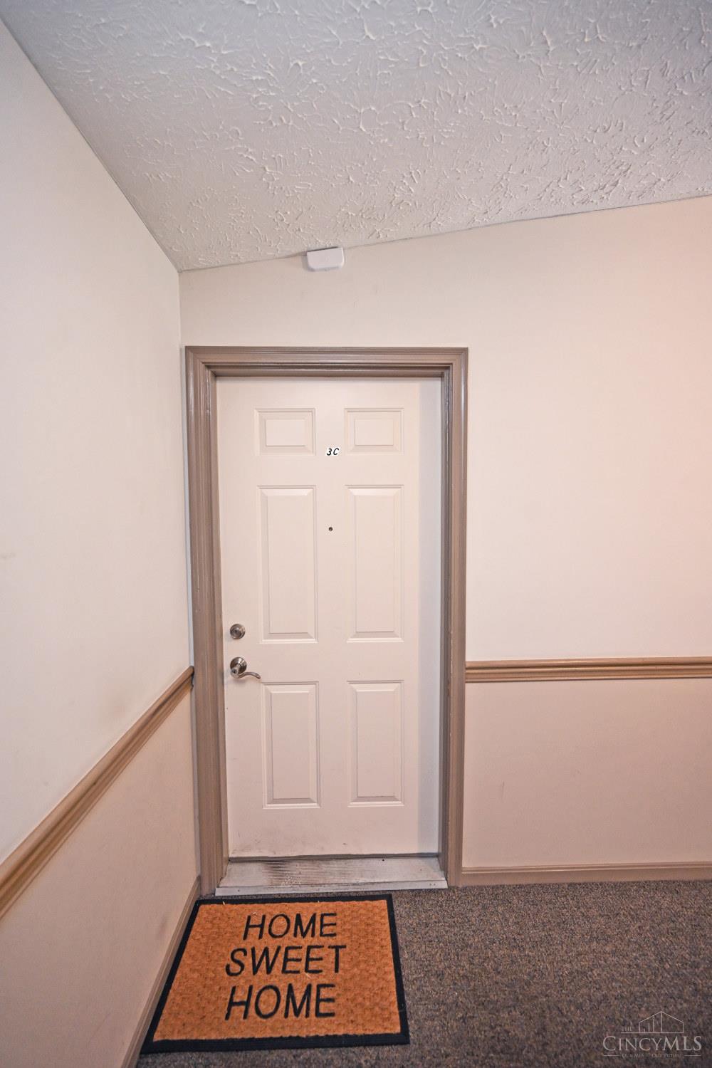 5761 Cheviot Road, Unit 3C Cincinnati, OH 45247 - Photo 6 of 34 Welcome to Coventry Place West, where comfort and convenience come together in this well-maintained 2-bedroom, 2 full bath condo. Located in an elevator-served building, this inviting residence offers a spacious and functional layout designed for easy living. The open living and dining areas flow seamlessly to a private covered balcony—perfect for morning coffee or unwinding at the end of the day—creating an ideal setting for both everyday living and entertaining. The kitchen features ample cabinetry and workspace, while a dedicated laundry area adds everyday convenience. The generously sized primary suite includes an ensuite bath, complemented by a well-proportioned secondary bedroom and full hall bath. Lovingly maintained by the same owner since construction, with additional highlights including a detached one-car garage and low-maintenance living in a desirable, welcoming community. Ideally located minutes from shopping and dining with quick and easy access to highways.