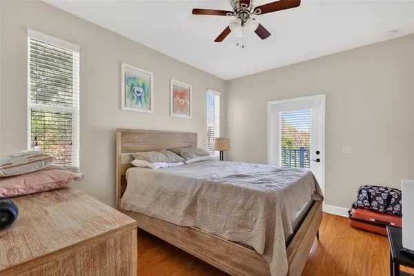 a bedroom with a bed and a table in it