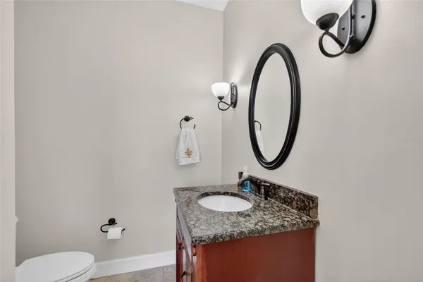 a bedroom with a bed and a desk