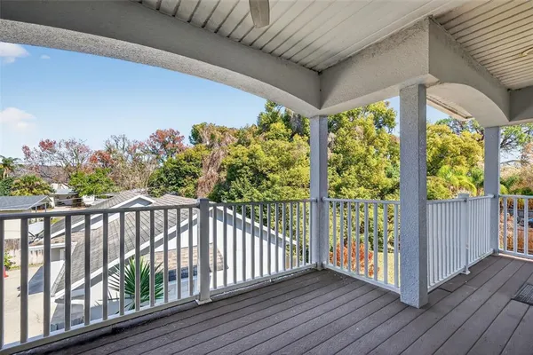 a view of a swimming pool with an outdoor space and seating area
