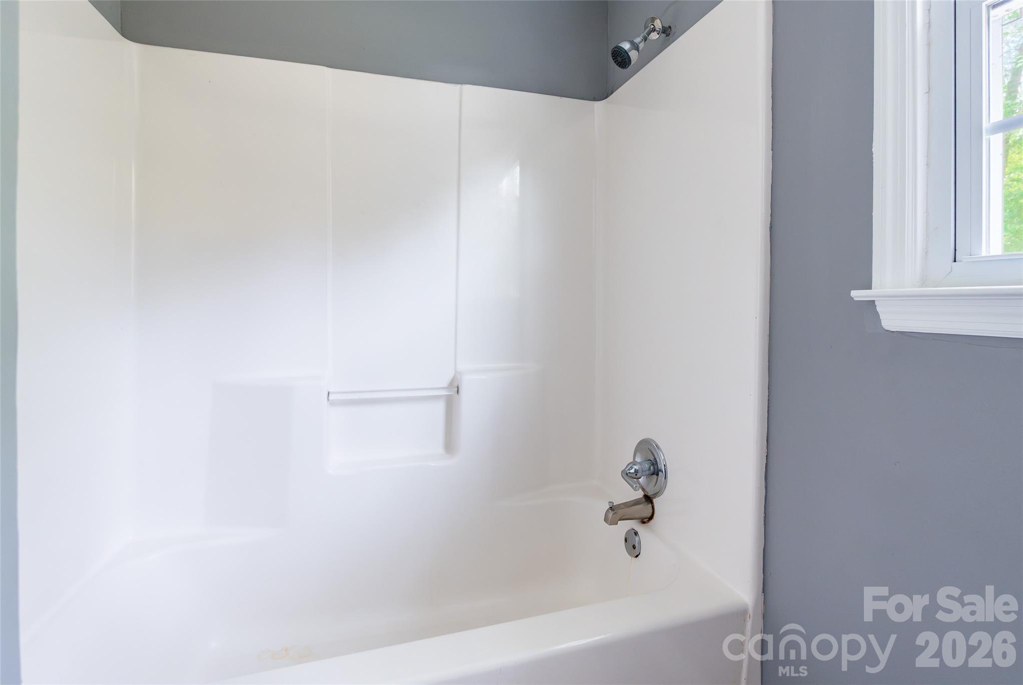 2823 Lyndell Way Lancaster, SC 29720 - Photo 15 of 19 a white bath tub sitting next to a window