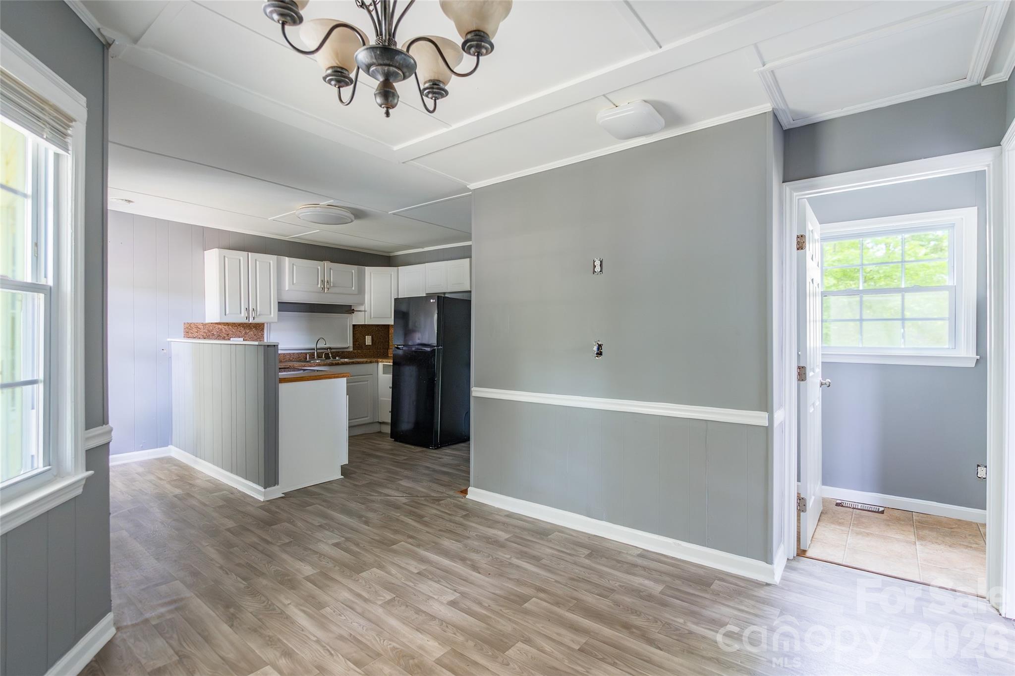 2823 Lyndell Way Lancaster, SC 29720 - Photo 8 of 19 a kitchen with stainless steel appliances granite countertop a refrigerator and a sink
