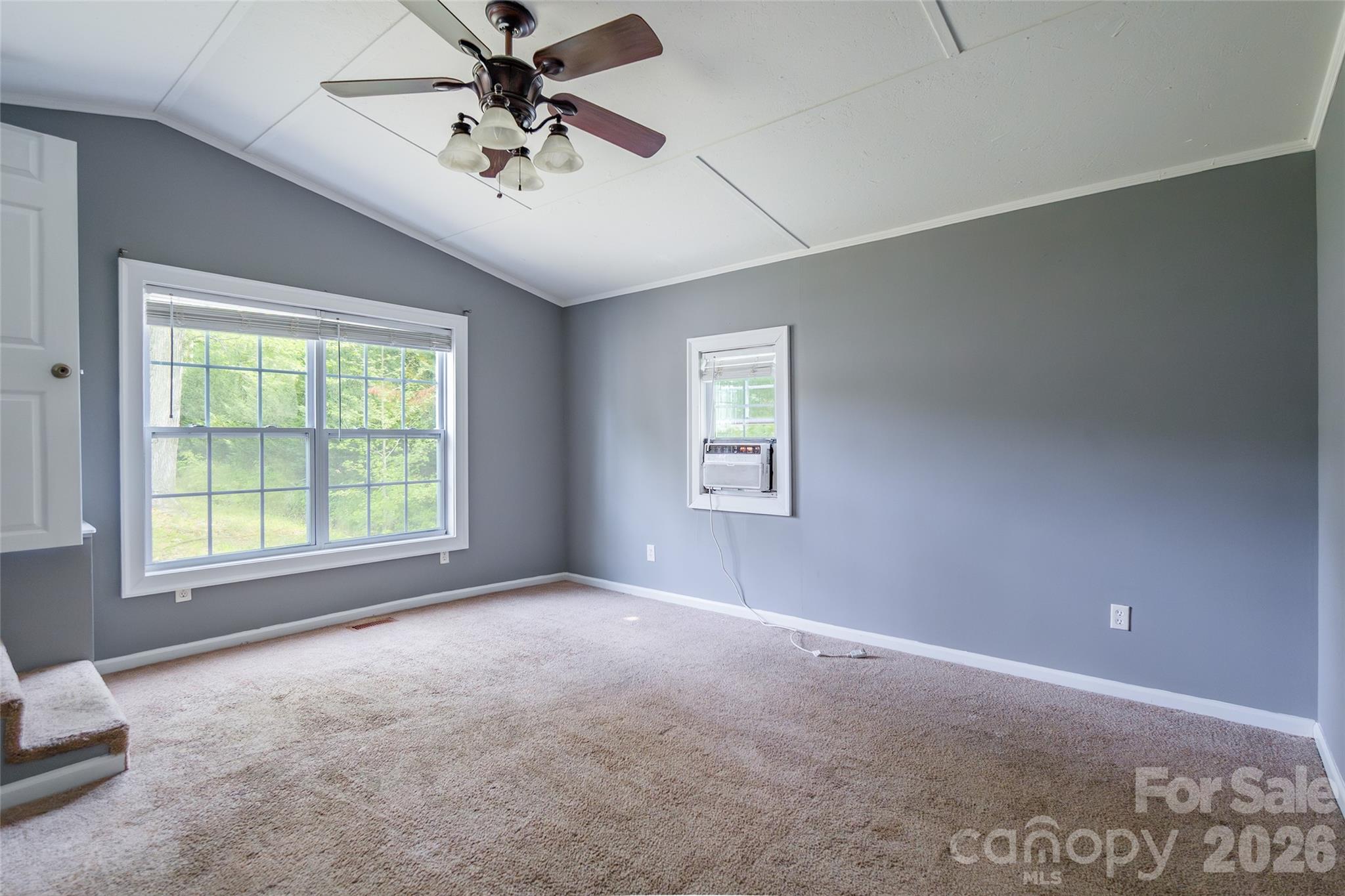 2823 Lyndell Way Lancaster, SC 29720 - Photo 10 of 19 a view of a livingroom with a ceiling fan and window