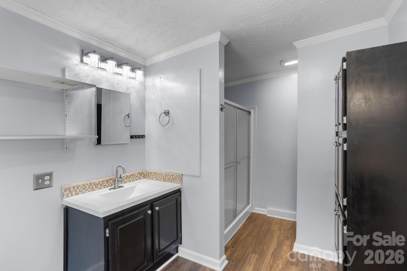4855 Talley Road Walkertown, NC 27051 - Photo 23 of 45 a bathroom with a sink and a mirror