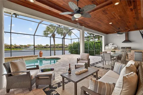 a view of a swimming pool with a lounge chairs