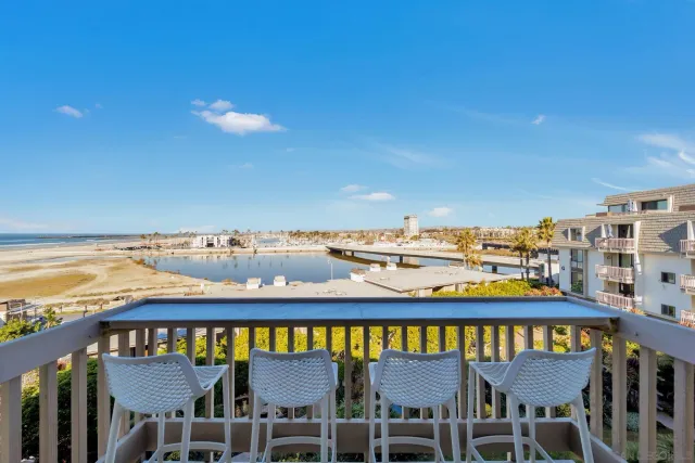 a view of a city skyline from a balcony