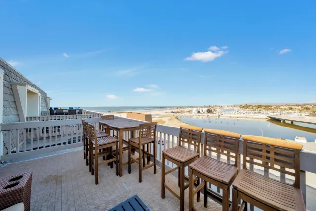 a view of a chairs and table on the terrace