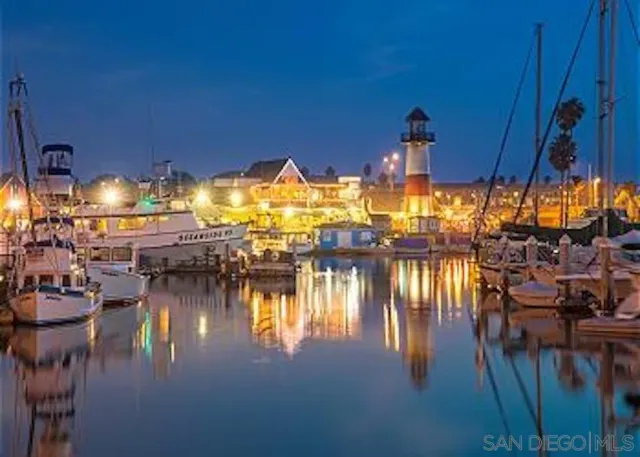 a view of a swimming pool and lounge chair