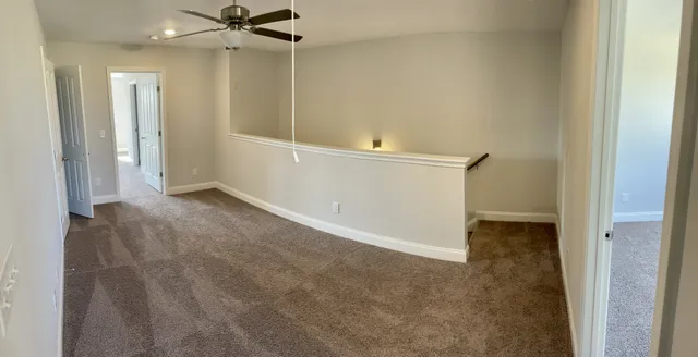 an empty room with a bathroom