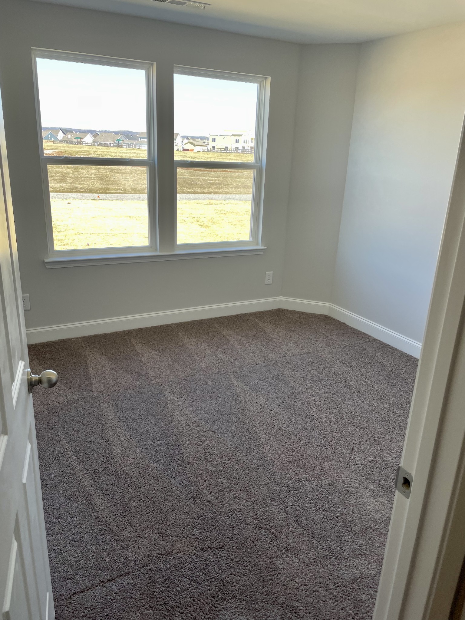 1004 June Wilde Ridge Spring Hill, TN 37174 - Photo 10 of 11 an empty room with a window