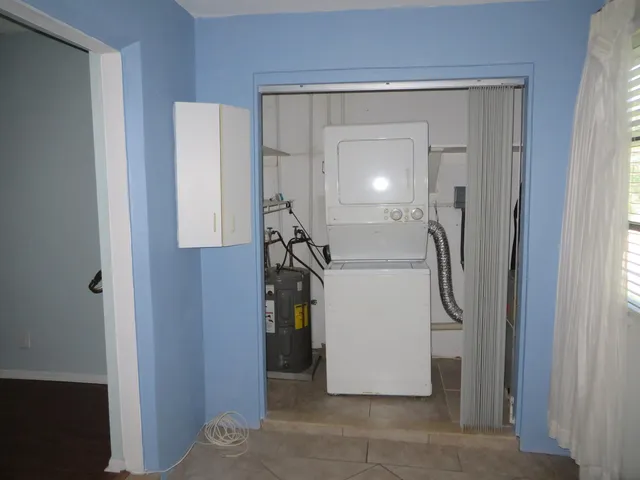 a view of a swimming pool with a yard