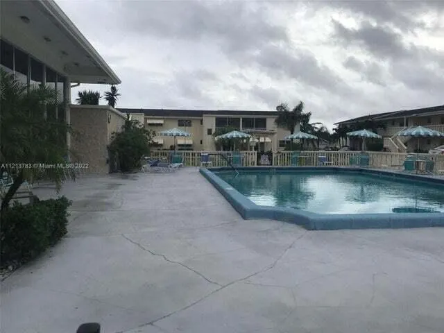 a view of building with yard