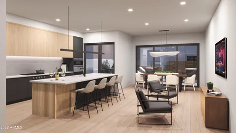 a living room with furniture a flat screen tv and a window