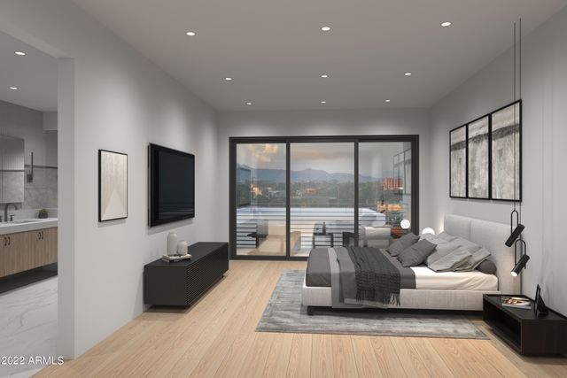 a view of a big room with floor to ceiling windows