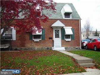 807 Fairview Road Swarthmore, PA 19081 - Photo 1 of 7 a front view of a house with garden