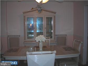 807 Fairview Road Swarthmore, PA 19081 - Photo 3 of 7 a bathroom with a granite countertop sink a toilet and mirror
