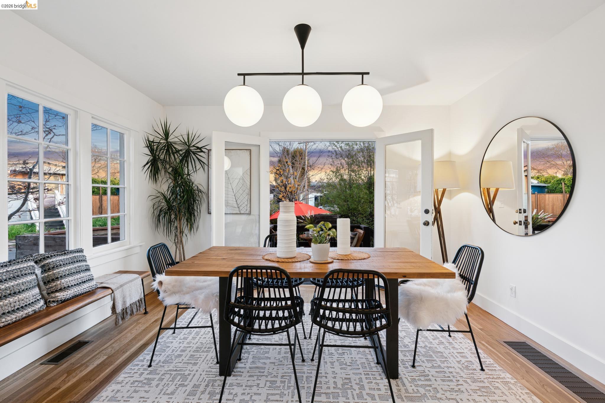 1400 Santa Fe Avenue Berkeley, CA 94702 - Photo 1 of 1 a table and chairs in a room