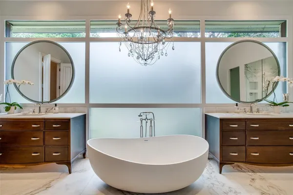 a room with a mirror and fan