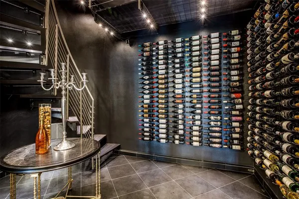 a room with chairs and white walls