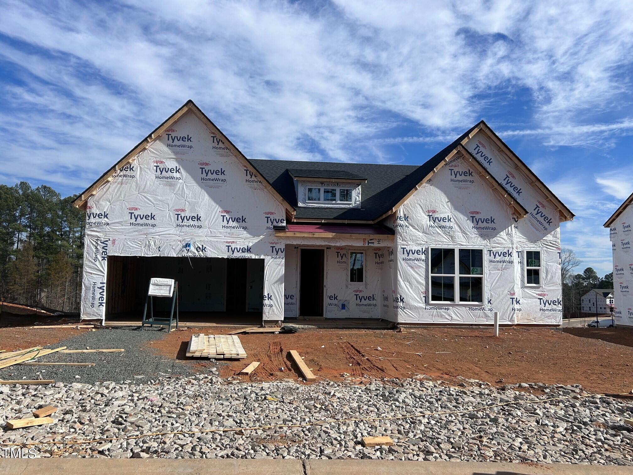 a view of a house with a patio