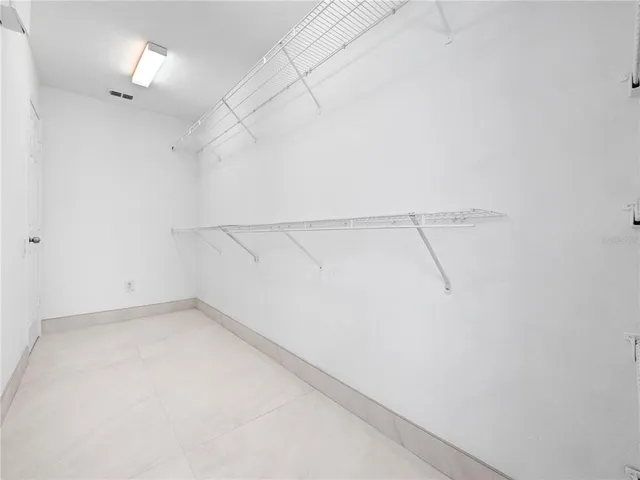 a view of a room with racks on the wall