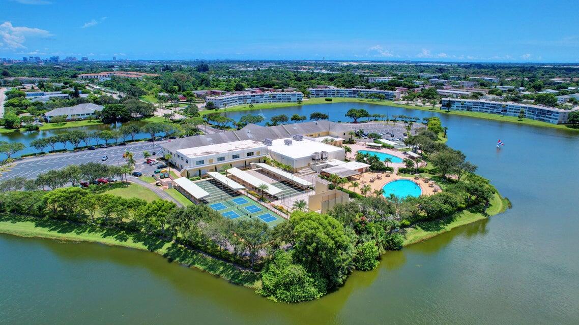 47 Camden B West Palm Beach, FL 33417 - Photo 28 of 36 an aerial view of a house with a lake view