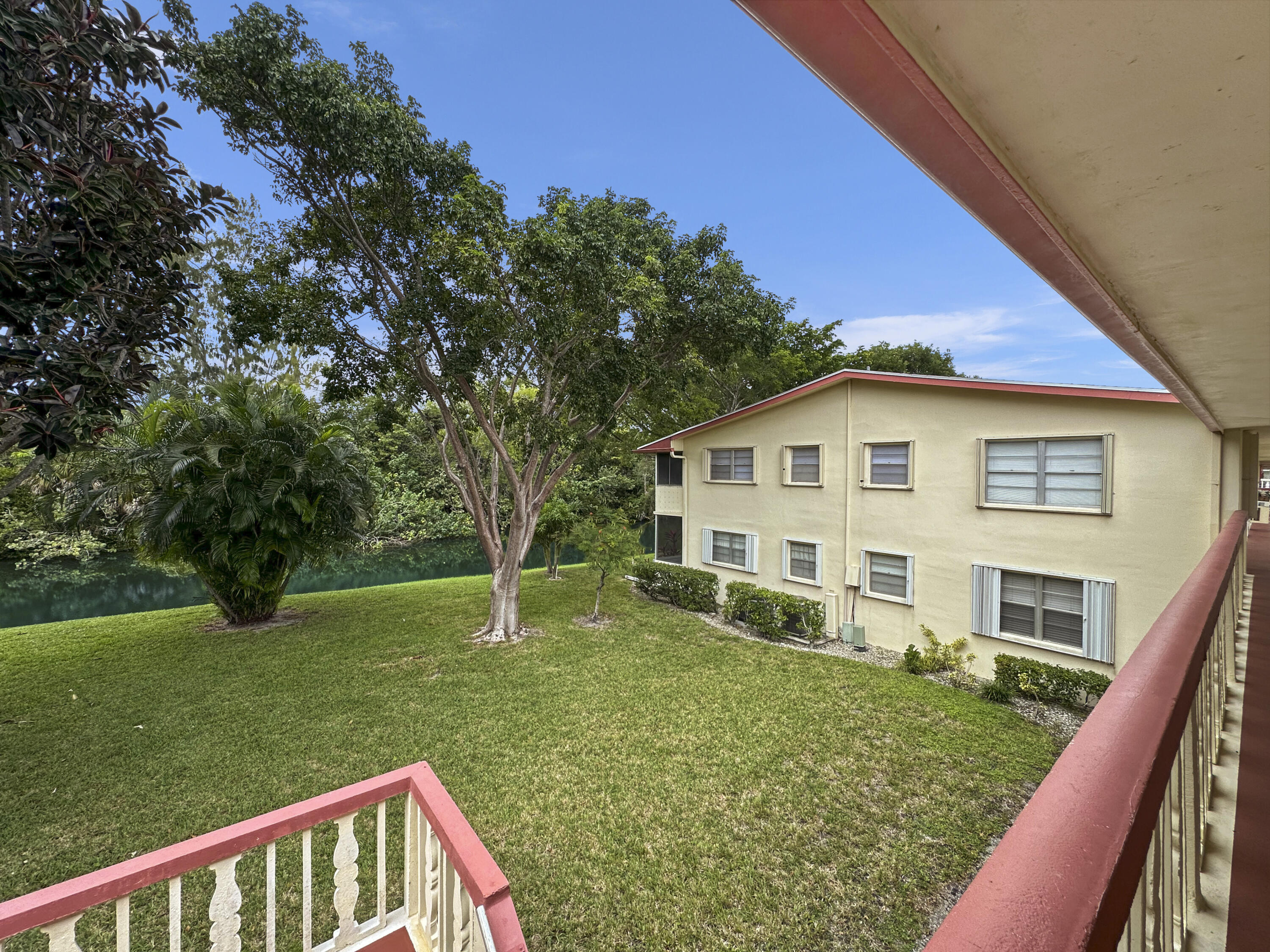 47 Camden B West Palm Beach, FL 33417 - Photo 36 of 36 a view of a house with a yard