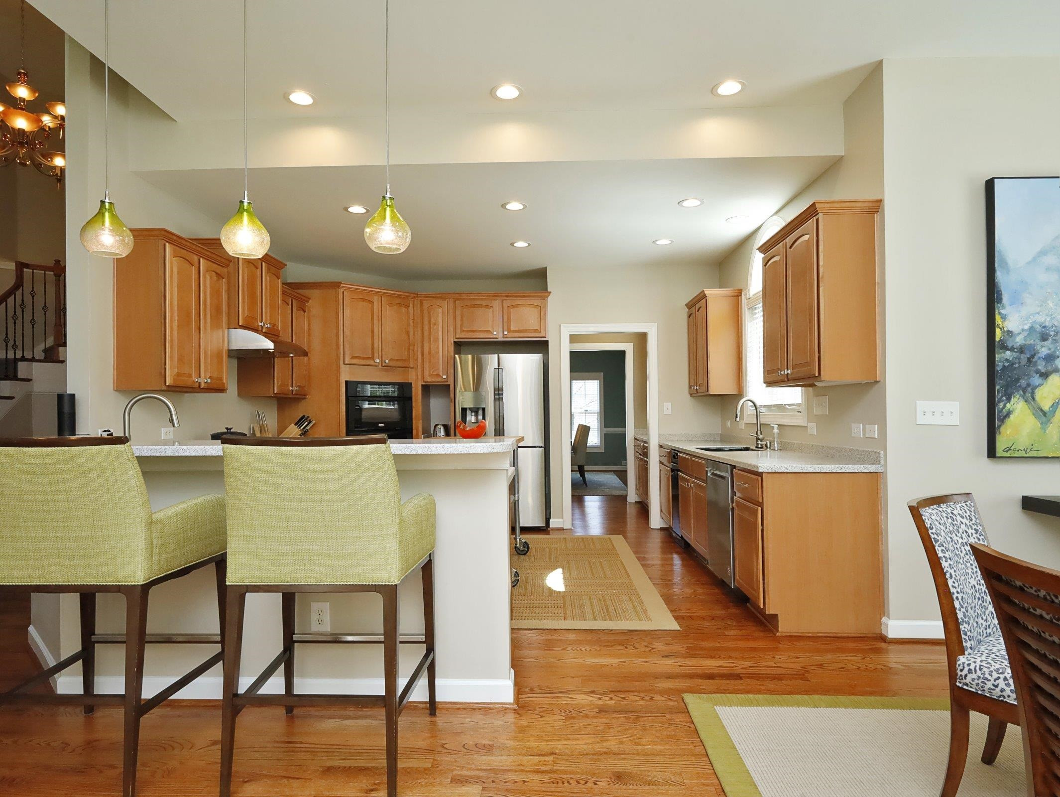 2565 Bittersweet Drive Durham, NC 27705 - Photo 17 of 37 a large kitchen with a table and chairs