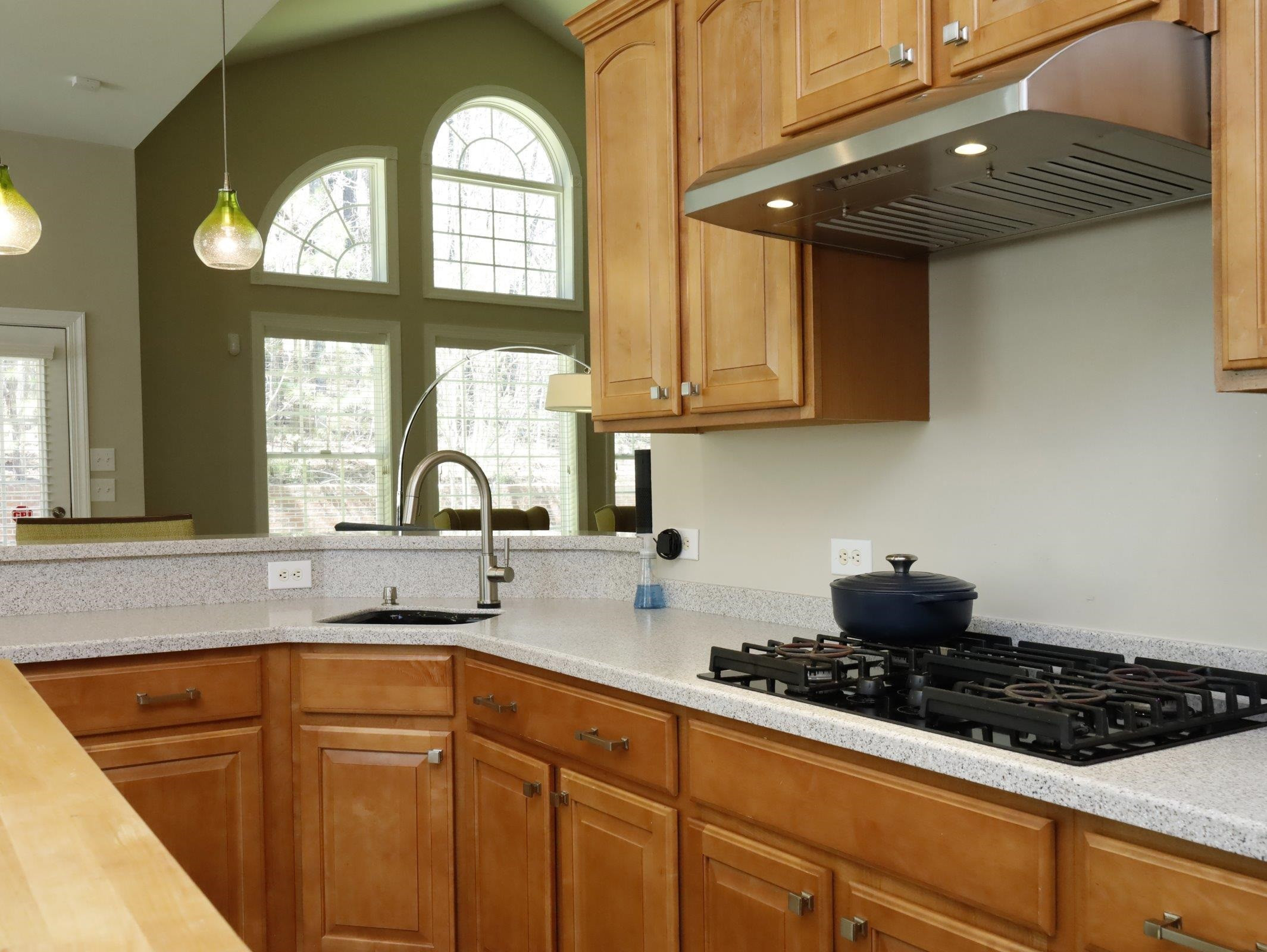 2565 Bittersweet Drive Durham, NC 27705 - Photo 20 of 37 a kitchen with stainless steel appliances granite countertop a sink a stove and cabinets