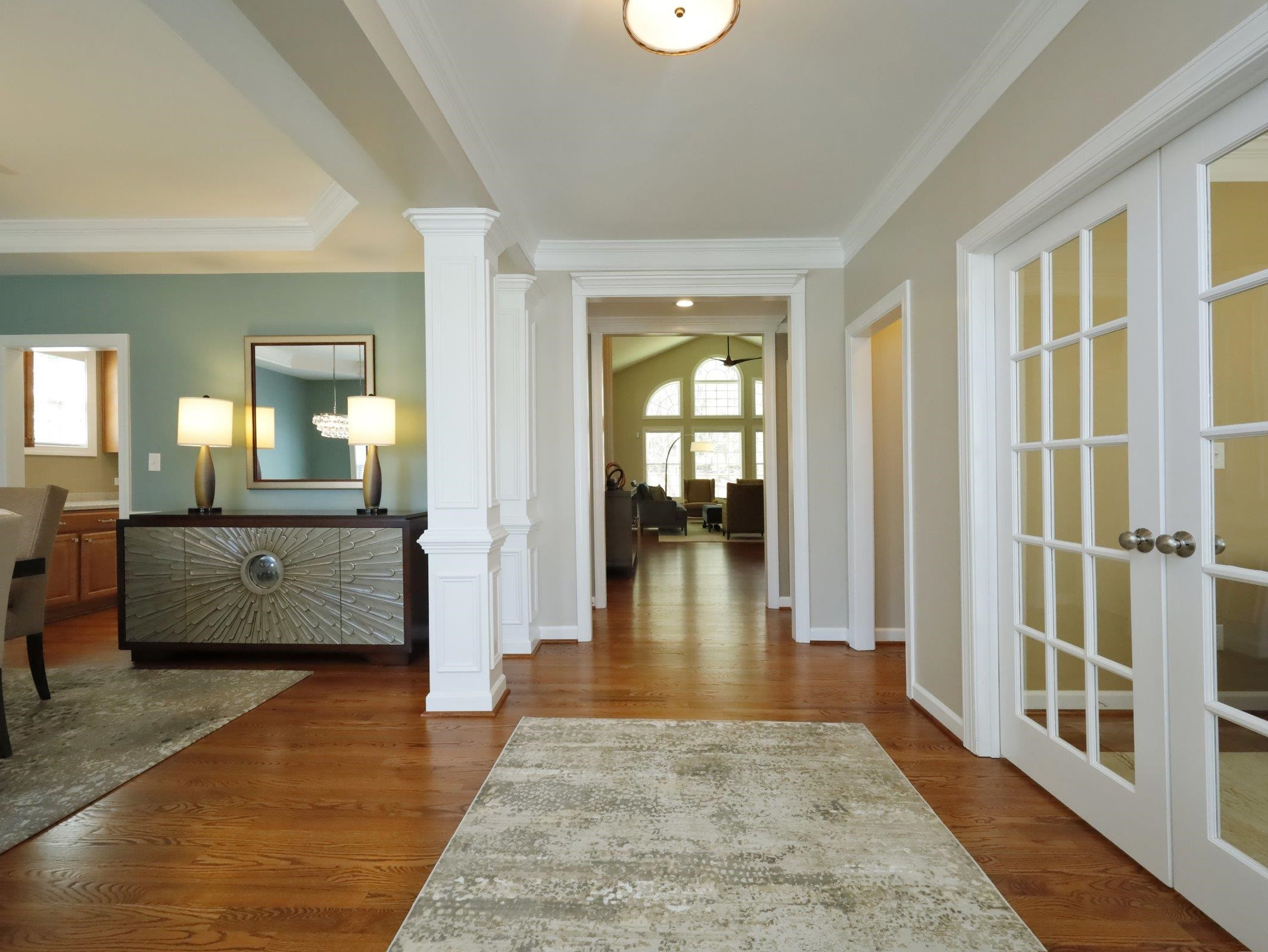 2565 Bittersweet Drive Durham, NC 27705 - Photo 4 of 37 a view of a room with wooden floor and furniture