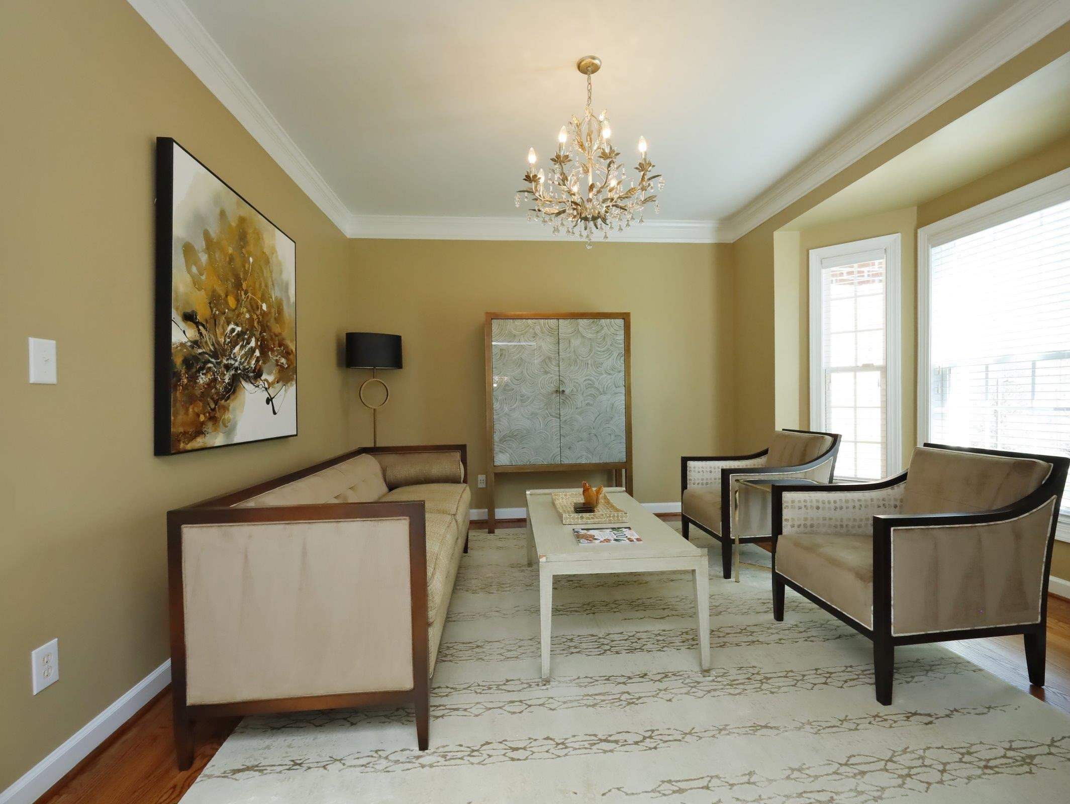 2565 Bittersweet Drive Durham, NC 27705 - Photo 6 of 37 a living room with furniture and a chandelier