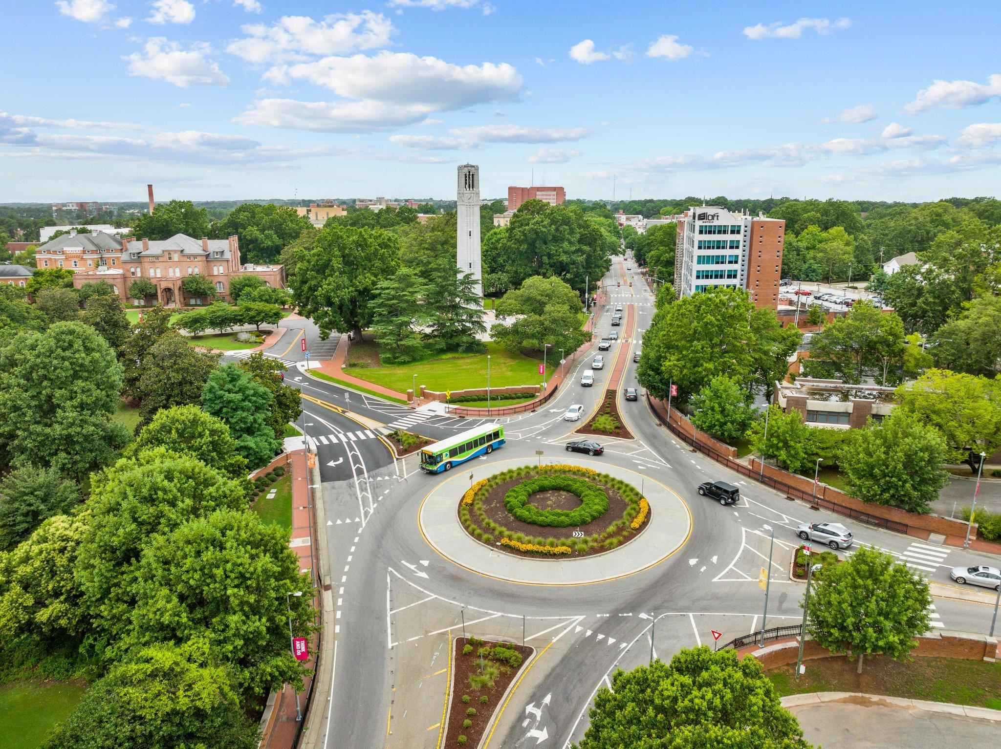 29 Enterprise Street, Unit 300 Raleigh, NC 27607 - Photo 7 of 17 an aerial view of a house with yard swimming pool and outdoor seating