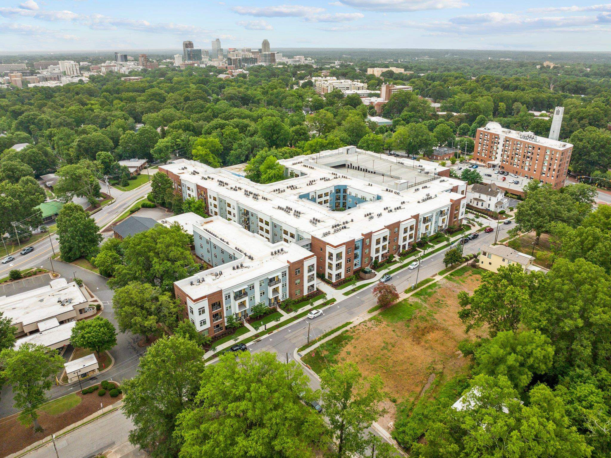 29 Enterprise Street, Unit 300 Raleigh, NC 27607 - Photo 8 of 17 a view of a city with tall buildings