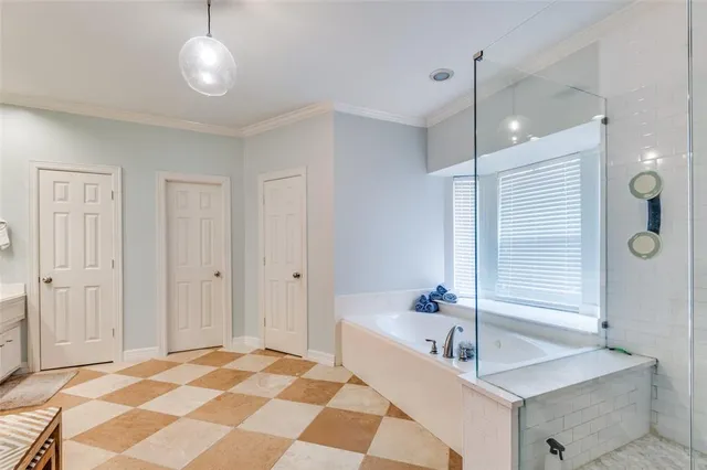 a bathroom with a granite countertop sink a shower and a mirror