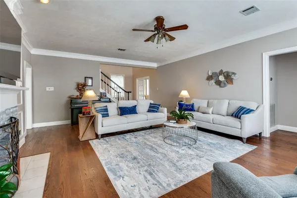 a living room with furniture and a couch