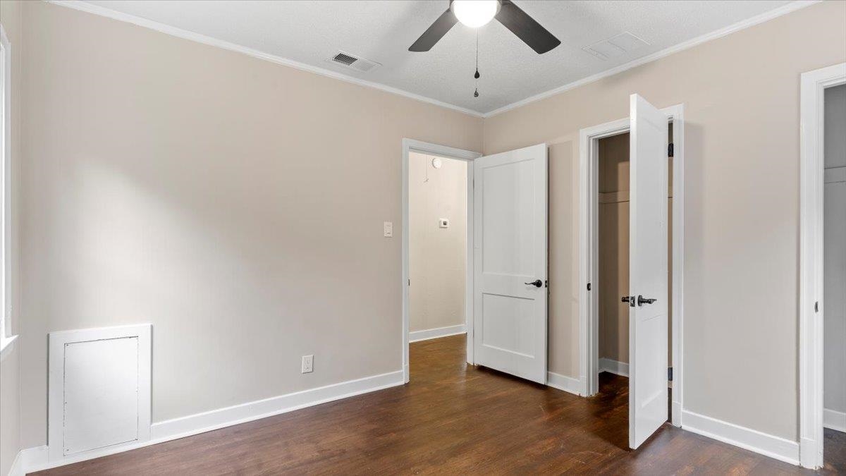 1075 Railton Road Memphis, TN 38111 - Photo 18 of 25 wooden floor in an empty room with a window