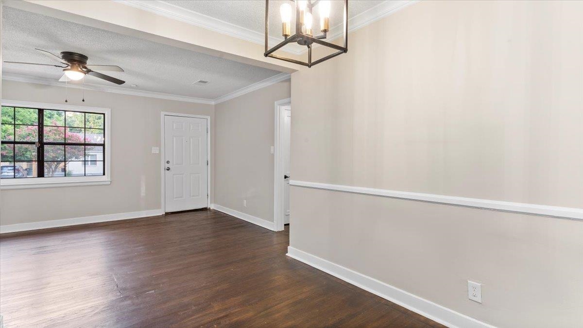 1075 Railton Road Memphis, TN 38111 - Photo 8 of 25 wooden floor in an empty room with a window