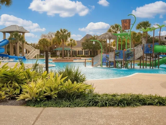 a view of a lake with a building in the background