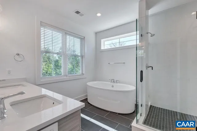 a bathroom with a sink and a bathtub