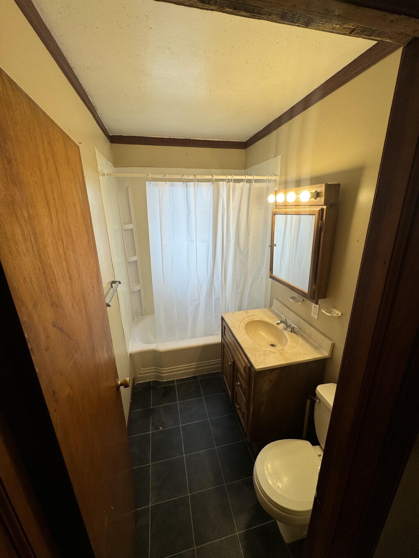 7710 West Keefe Avenue, Unit UPPR Milwaukee, WI 53222 - Photo 11 of 13 Bathroom