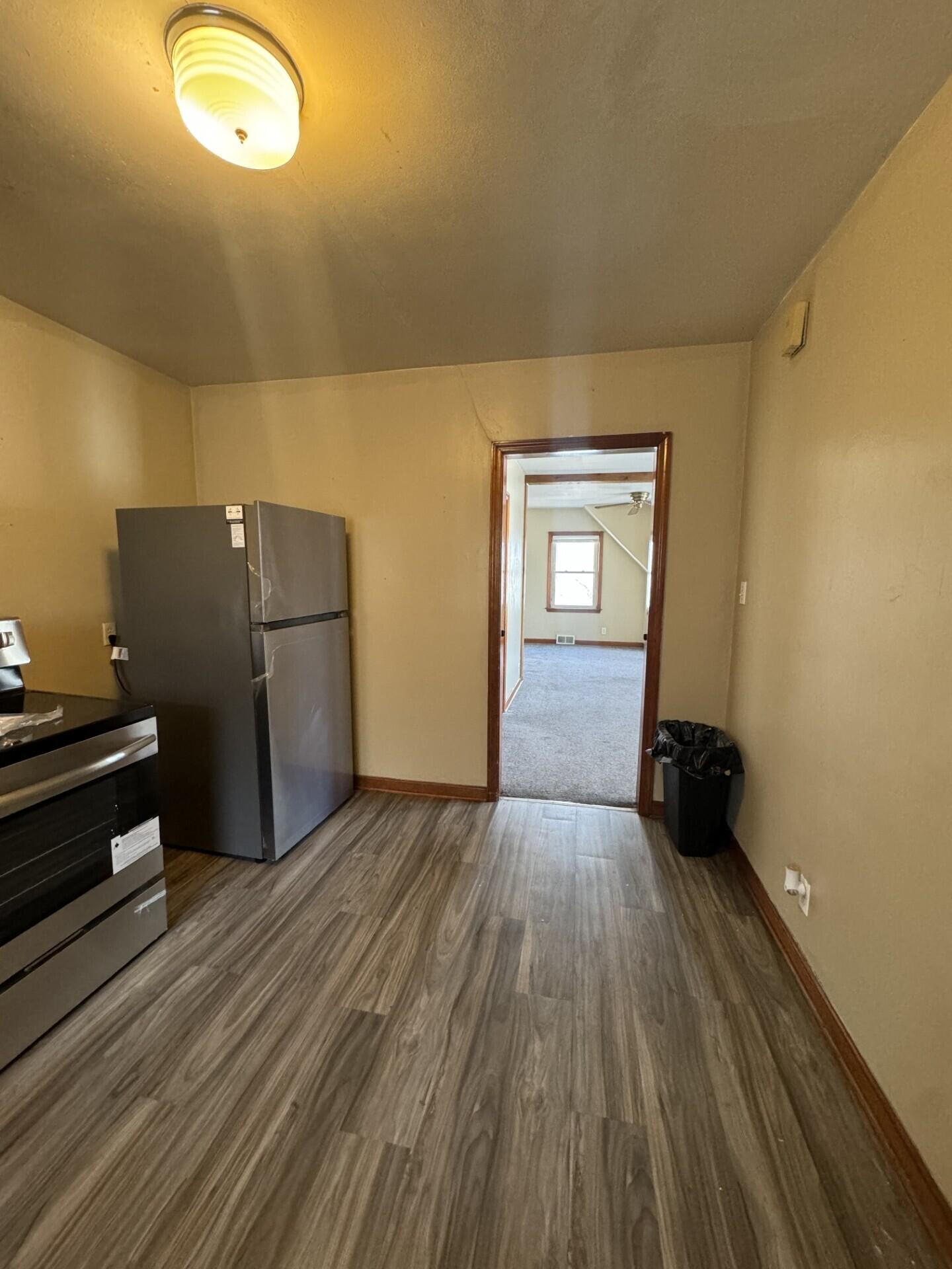 7710 West Keefe Avenue, Unit UPPR Milwaukee, WI 53222 - Photo 6 of 13 Kitchen