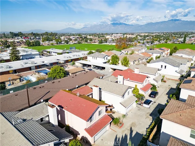 an aerial view of a houses with outdoor space
