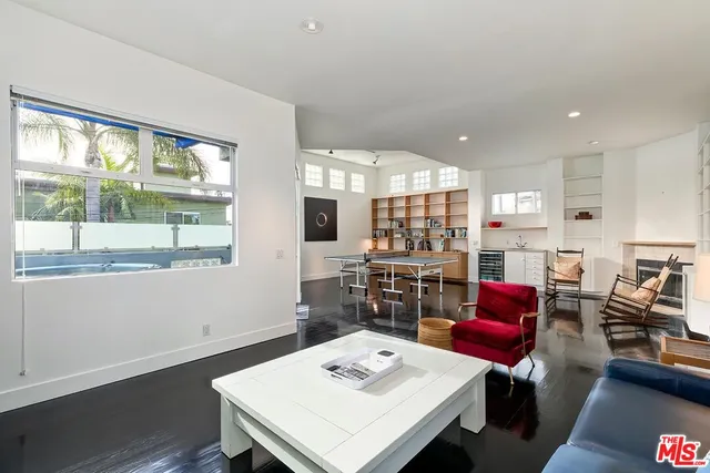 a table with chairs and a sink