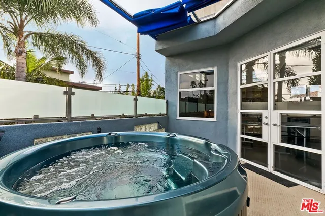 a view of backyard with outdoor seating