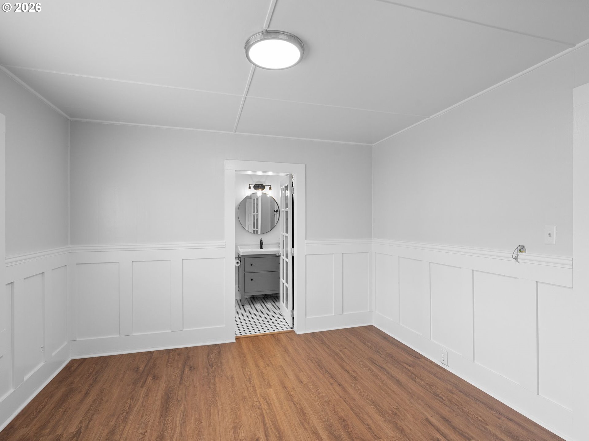 204 South Main Street Newberg, OR 97132 - Photo 15 of 28 a view of empty room with wooden floor