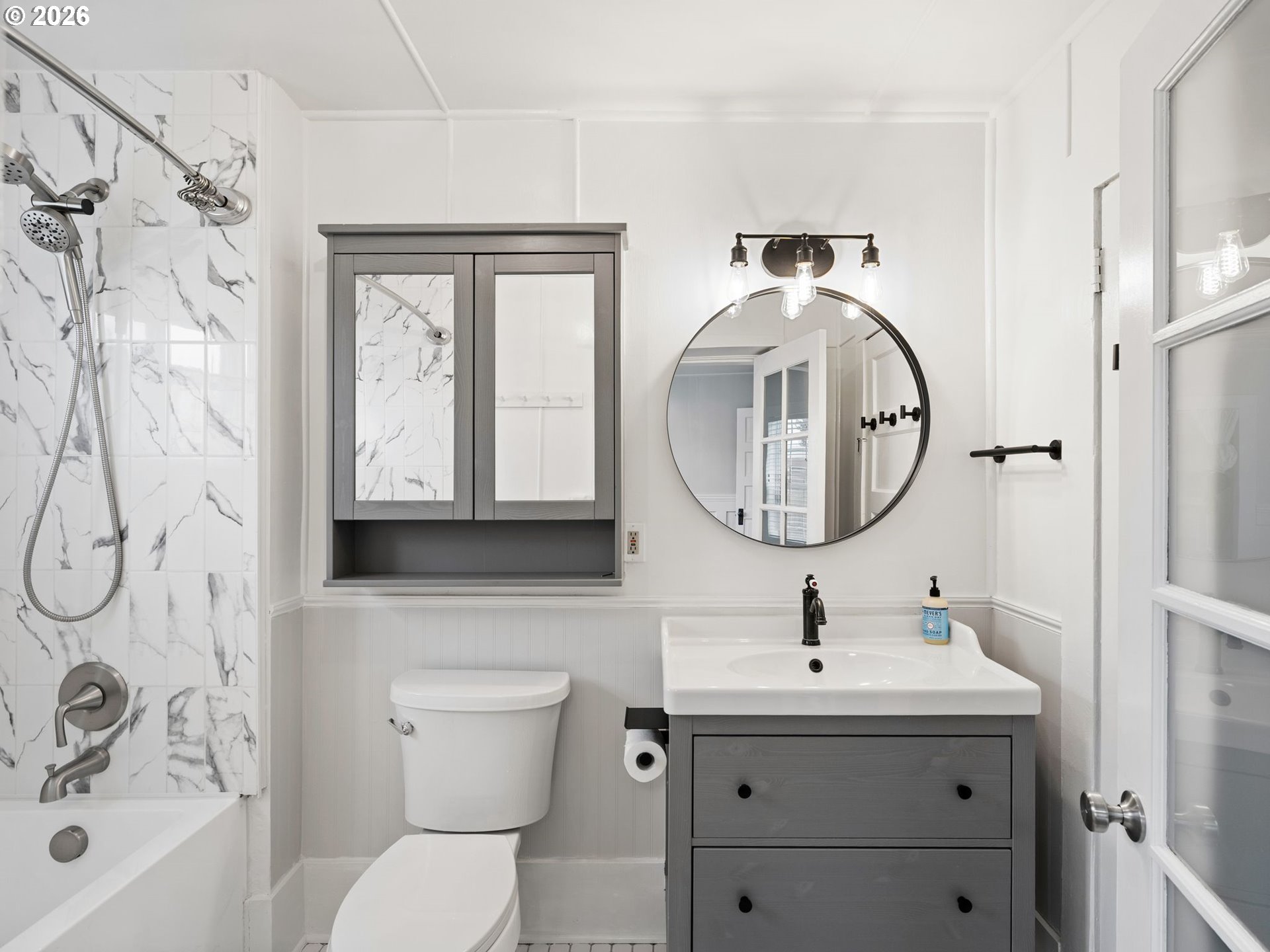 204 South Main Street Newberg, OR 97132 - Photo 16 of 28 a bathroom with a sink mirror and toilet