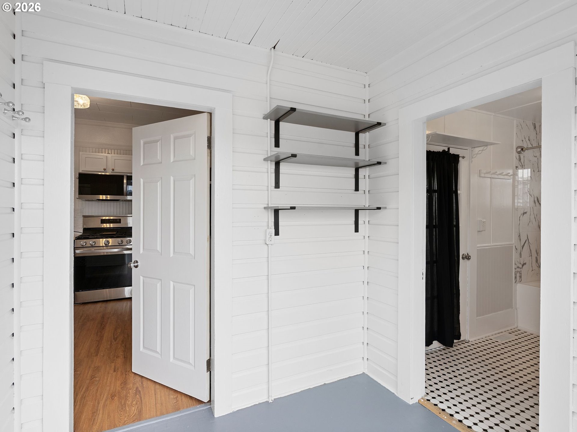 204 South Main Street Newberg, OR 97132 - Photo 20 of 28 a view of a bathroom with a sink and a mirror