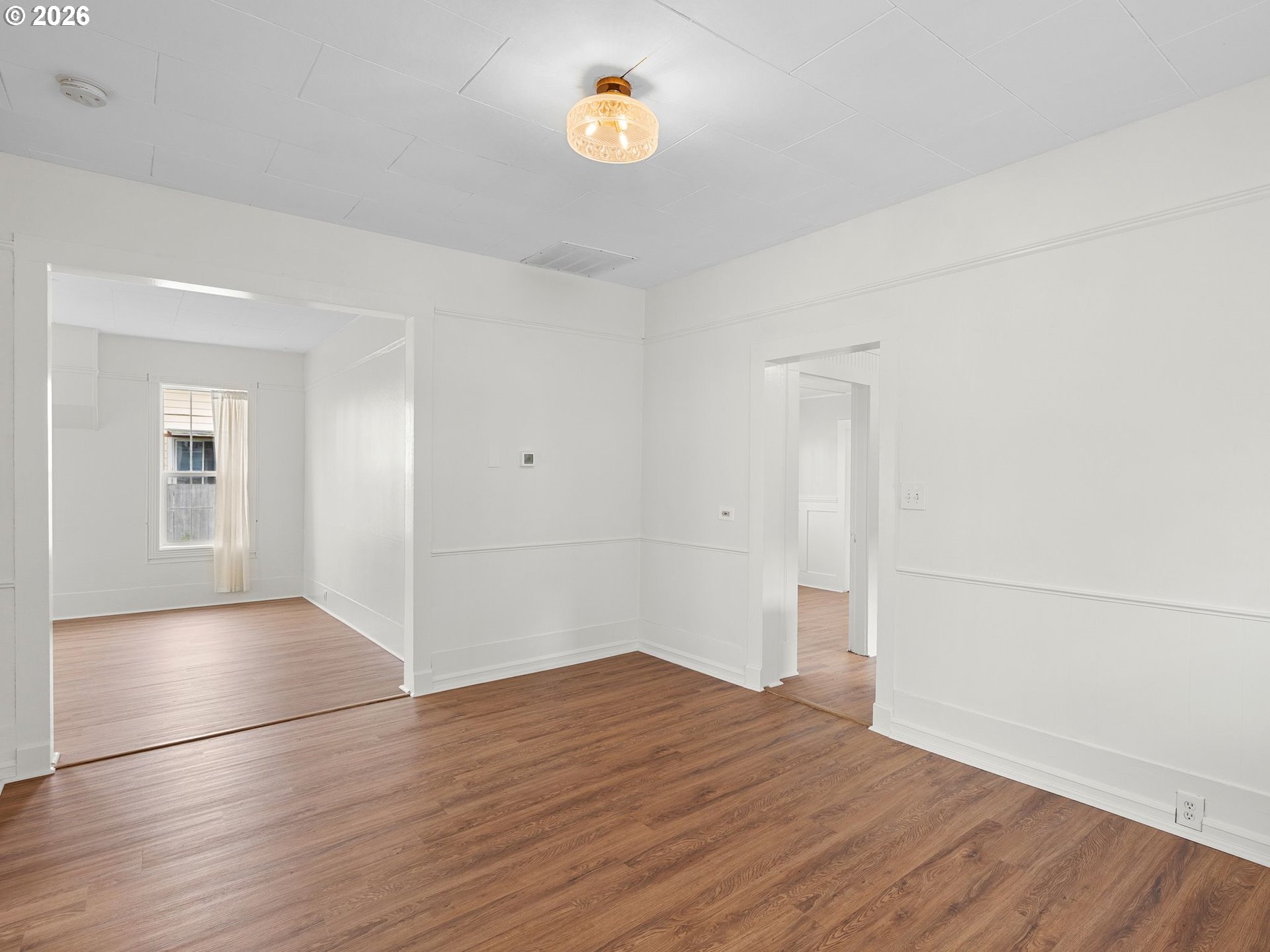 204 South Main Street Newberg, OR 97132 - Photo 7 of 28 a view of empty room with wooden floor